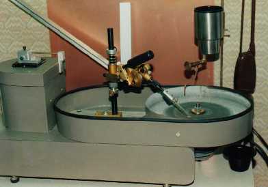 (Click To Zoom) custom-designed diamond lapping machine for cutting Brewster stubs